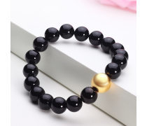 玛瑙配黄金手链与化妆品 奢华风尚的完美融合